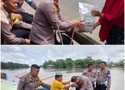 Kapolsek Perhentian Raja Berjuang Melawan Dampak Banjir Dalam Cooling System Pemilu Damai di Daerah Perairan