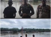 Kapolsek Siak Hulu Tinjau Dan Pantau Langsung Debit Air Pasca Banjir Di Desa Buluh Cina