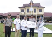 Kapolres Kampar Menyaksikan Penyerahan Santunan, PT. Asabri Dan Bank Mandiri Taspen Beri Perhatian Kepada Keluarga Alm. Ipda Apendra