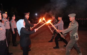 Kapolres Kampar Pimpin Upacara Taptu, Obor Kemerdekaan Dinyalakan Sebelum Pawai Menuju Lapangan Merdeka