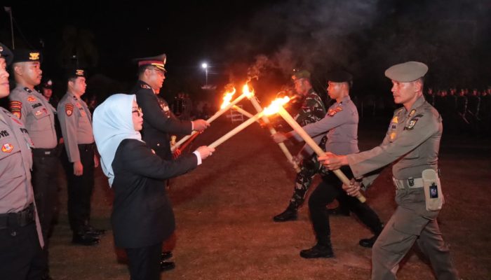 Kapolres Kampar Pimpin Upacara Taptu, Obor Kemerdekaan Dinyalakan Sebelum Pawai Menuju Lapangan Merdeka