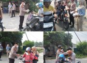 Kapolsek Siak Hulu Bagikan 1000 Masker Gratis, Antisipasi Dampak Kabut Asap